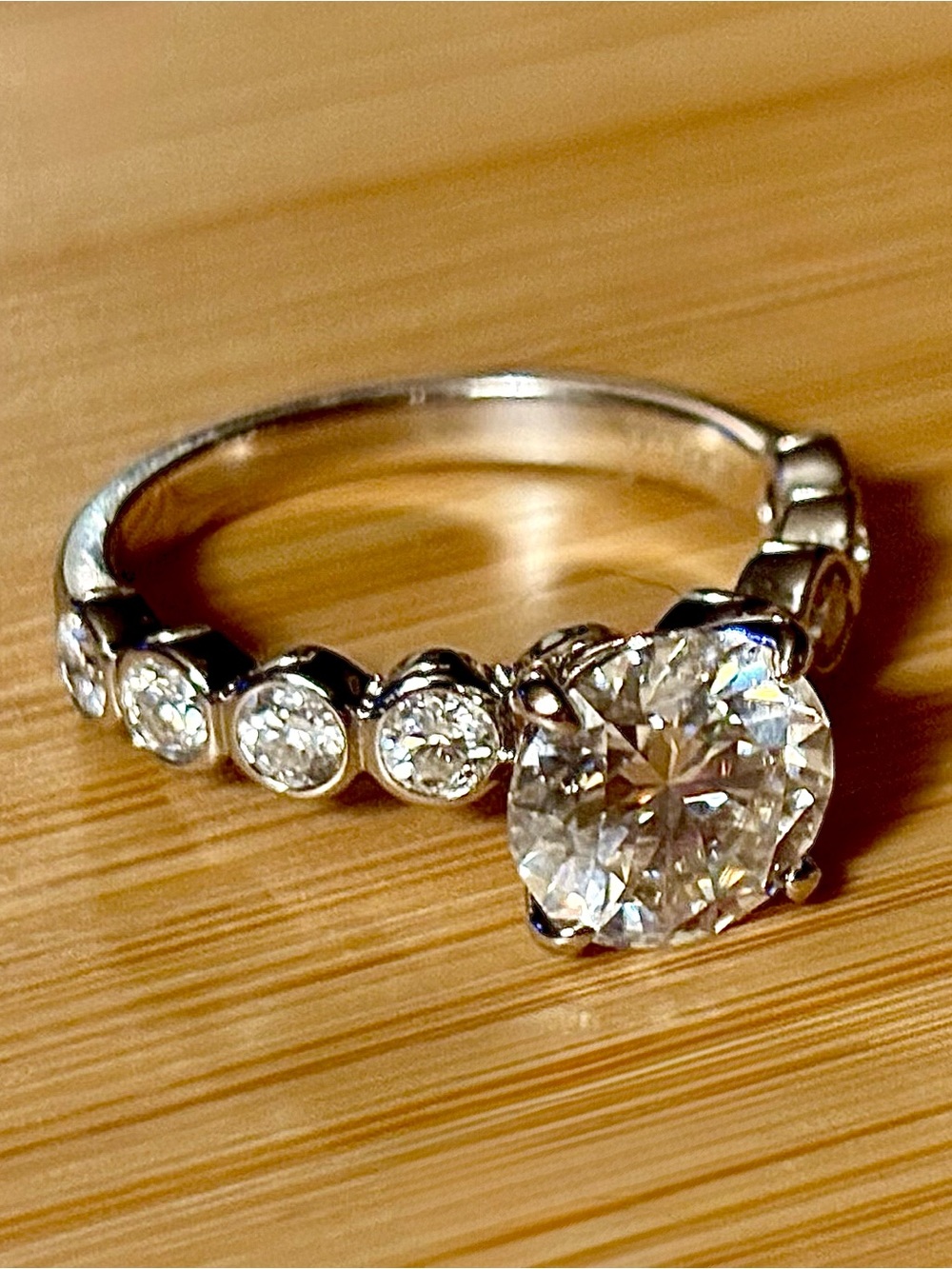 A 3.8ctw Moissanite designer ring with a 3ct center stone in sterling and 18k!